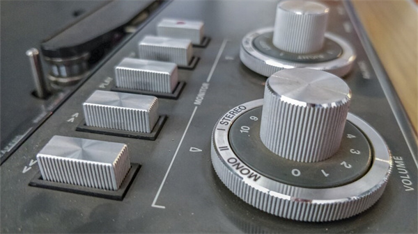 Material Design 13 closeup old dusty cdj table with blurred background 181624 19616